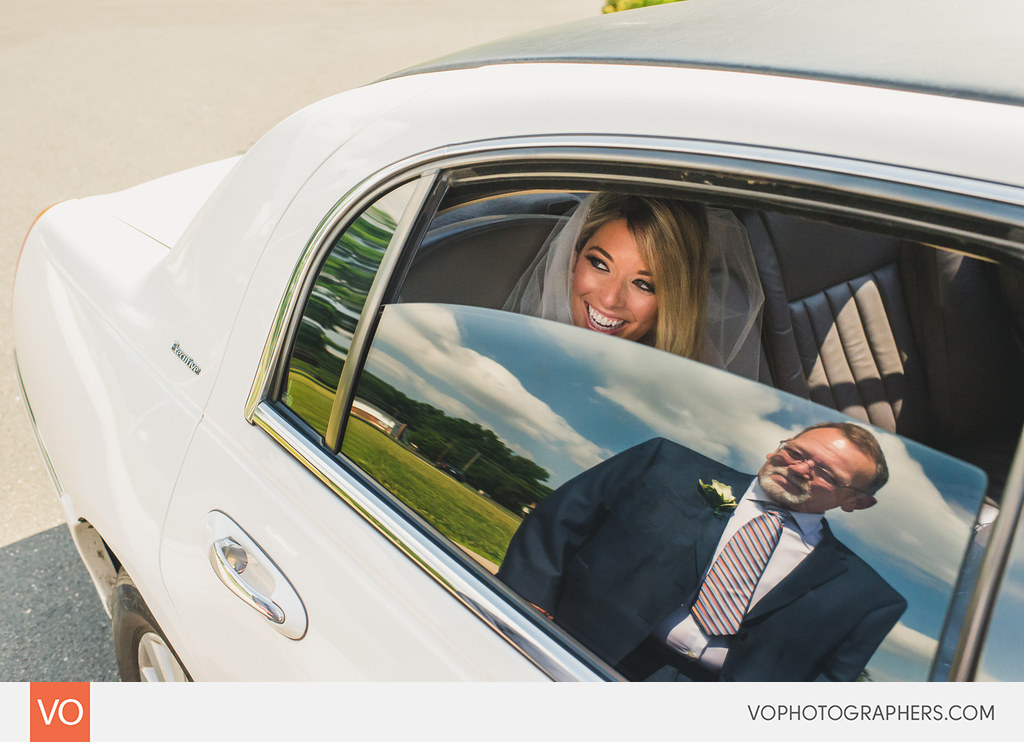 Father's reflection in the limo