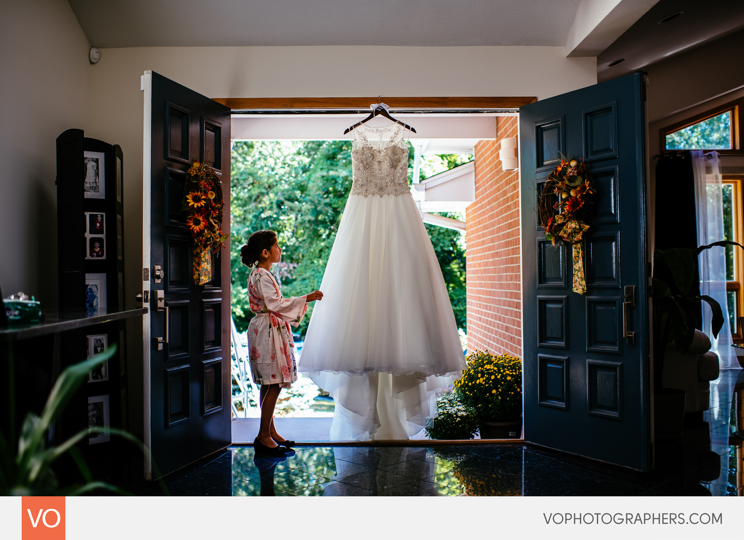 Wedding dress hanging in the doorway