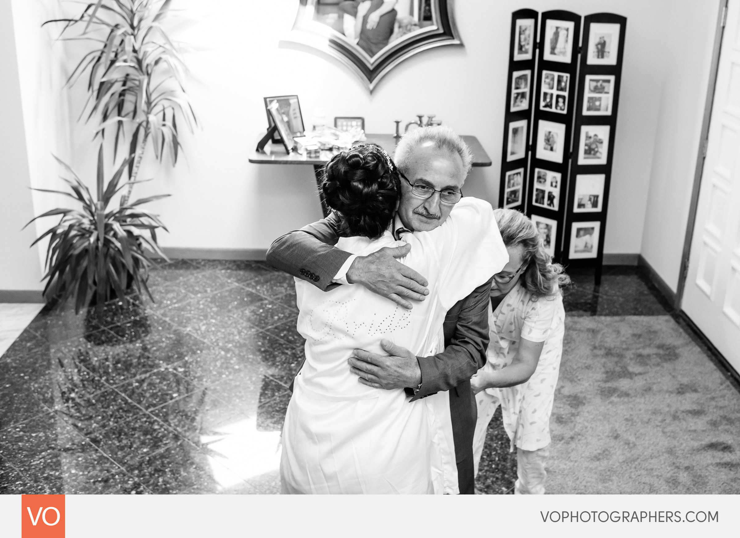 Bride hugging her father