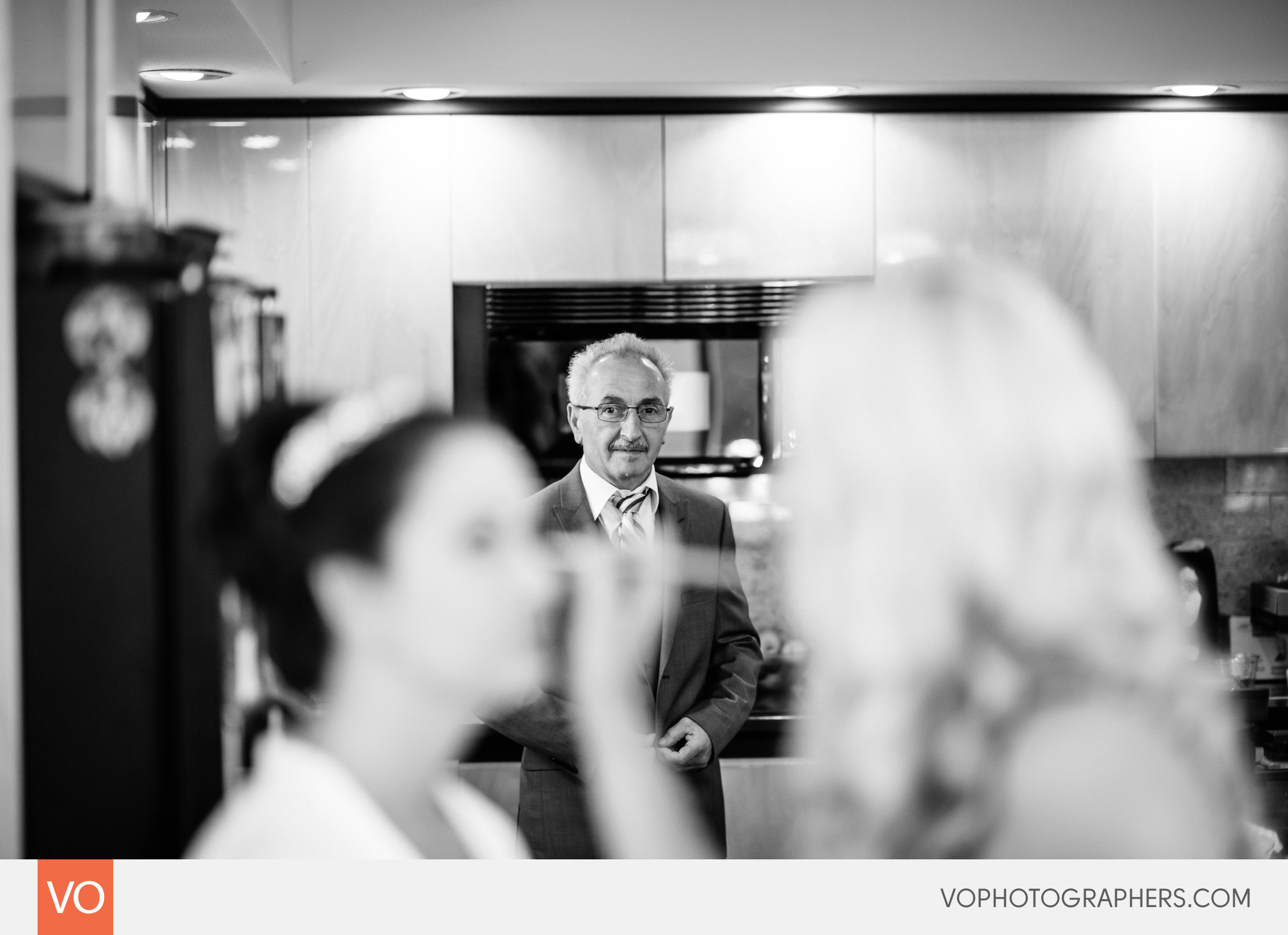 Bride's father looking at his beautiful daughter