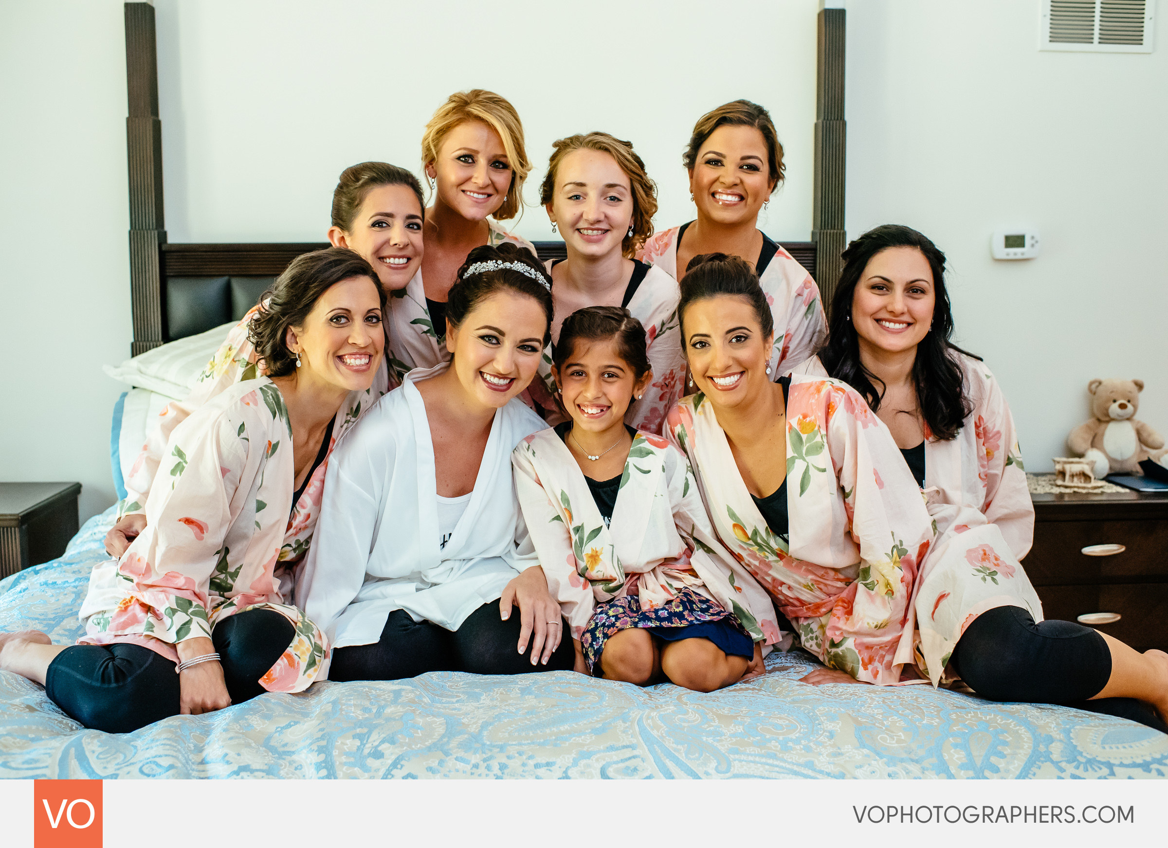 Bridesmaids on a bed