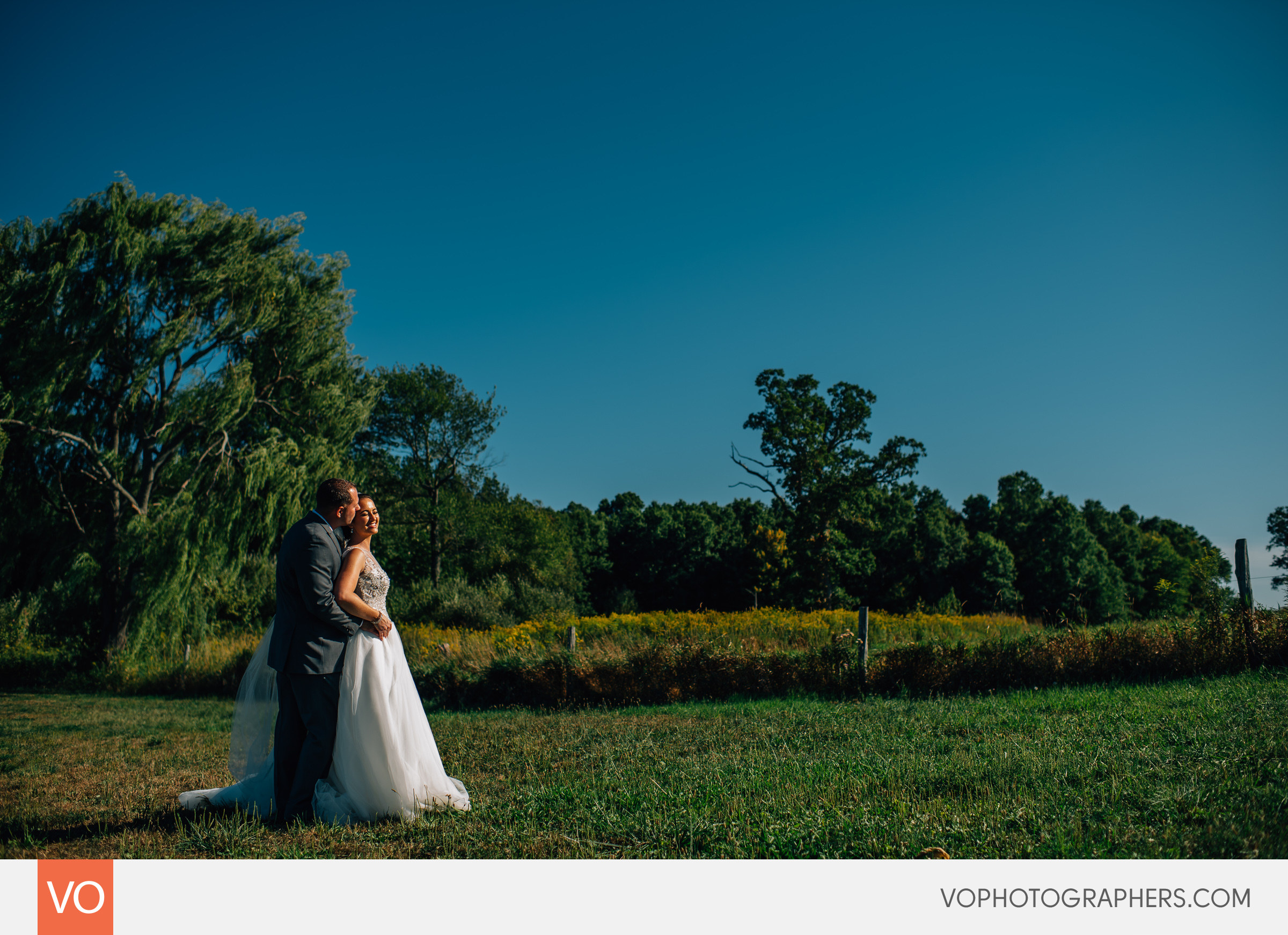 Newlyweds on a field