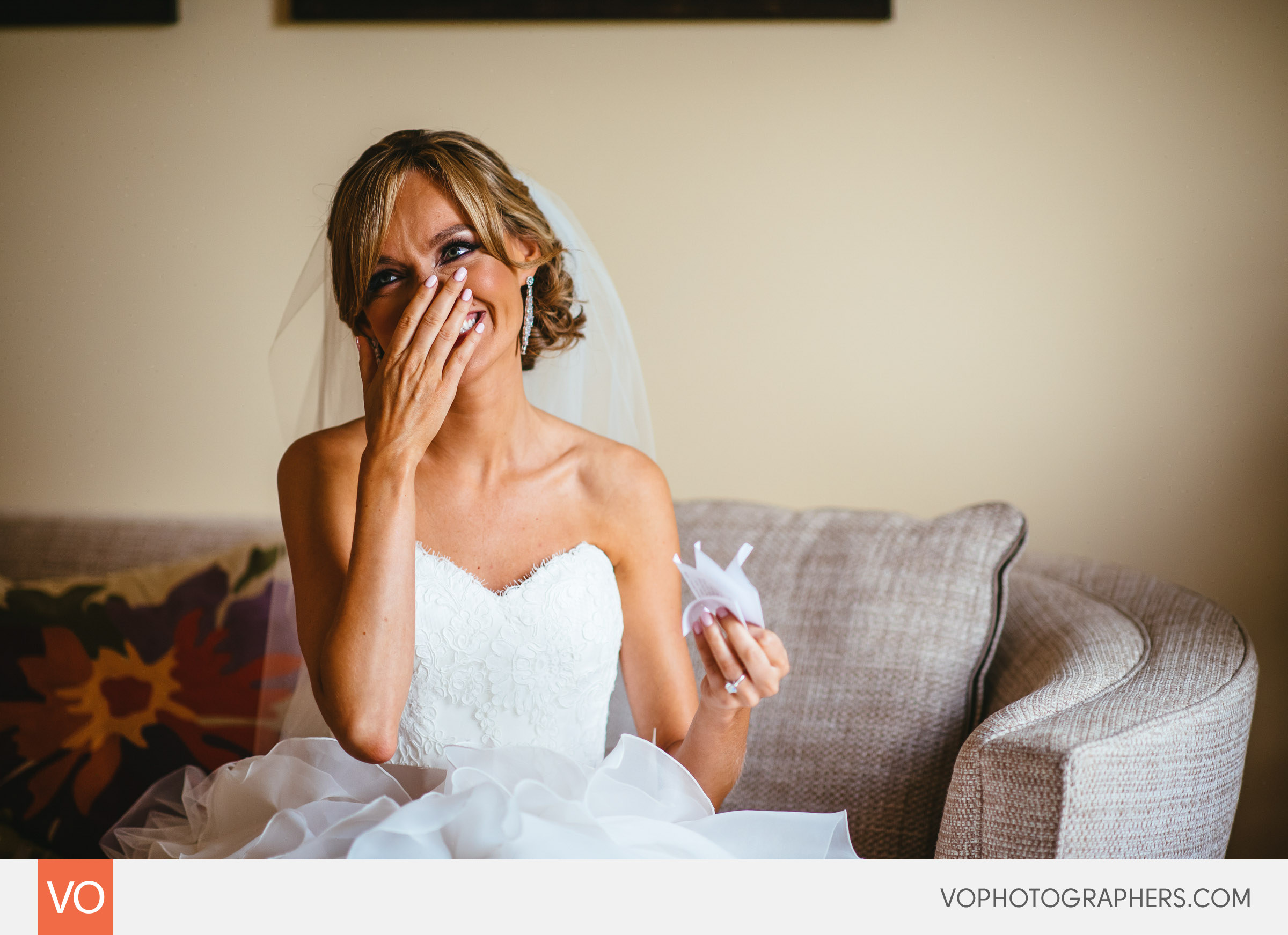 Bride reading a note from the Groom