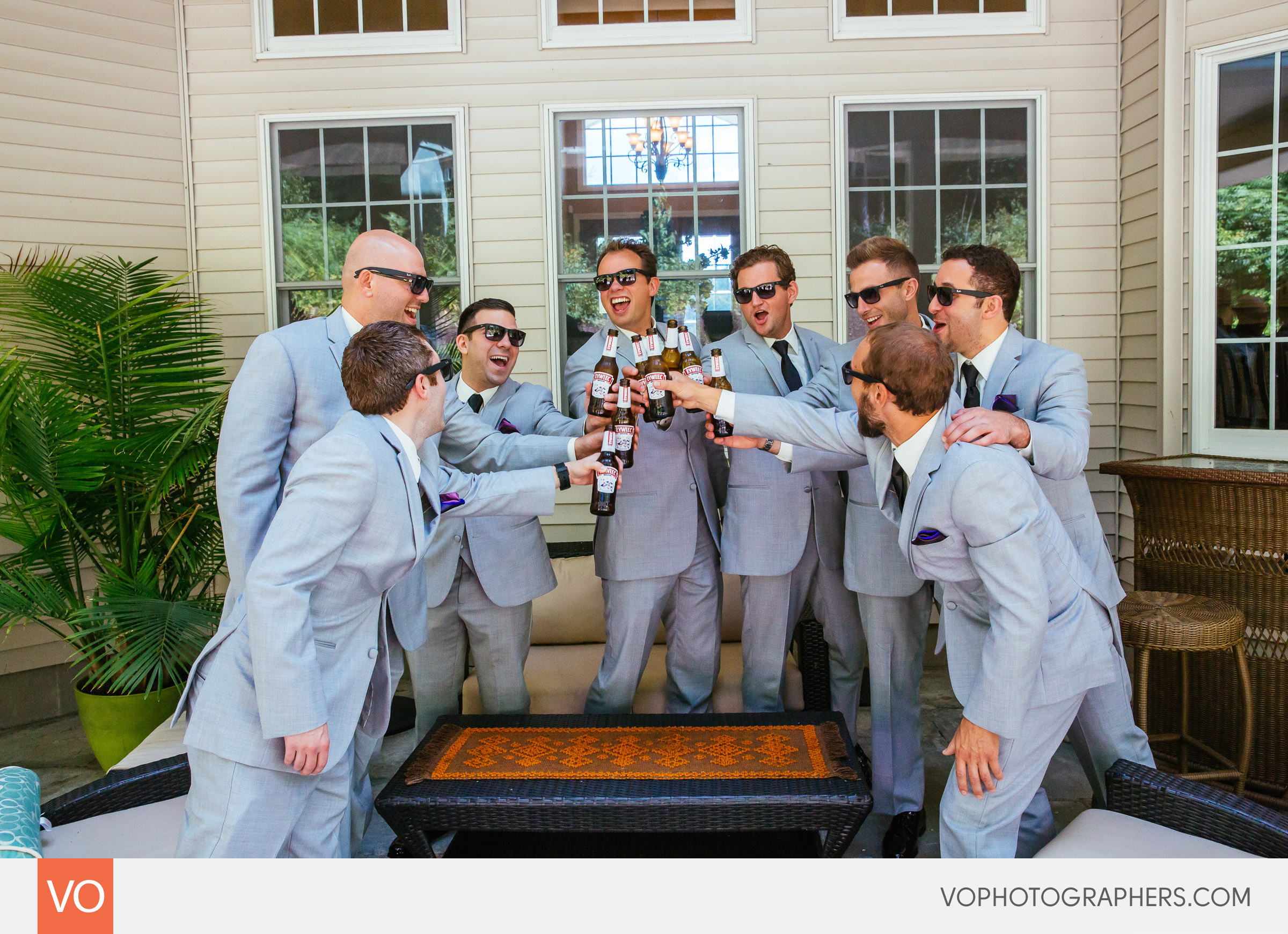 Groomsmen cheering with beer