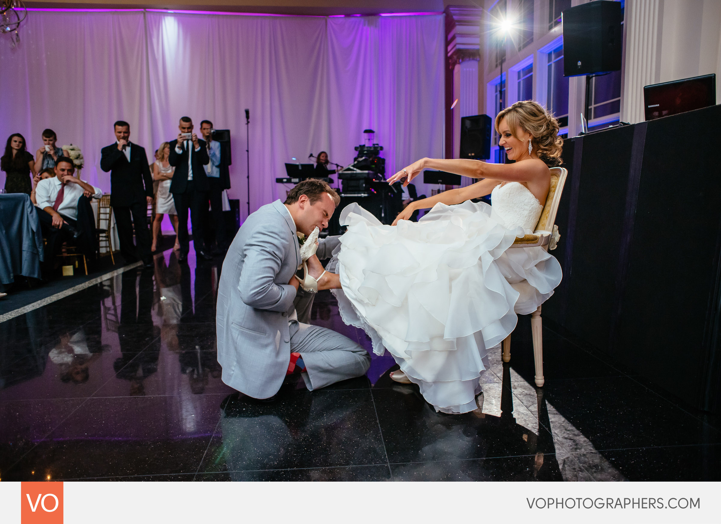 Groom taking off the Garter