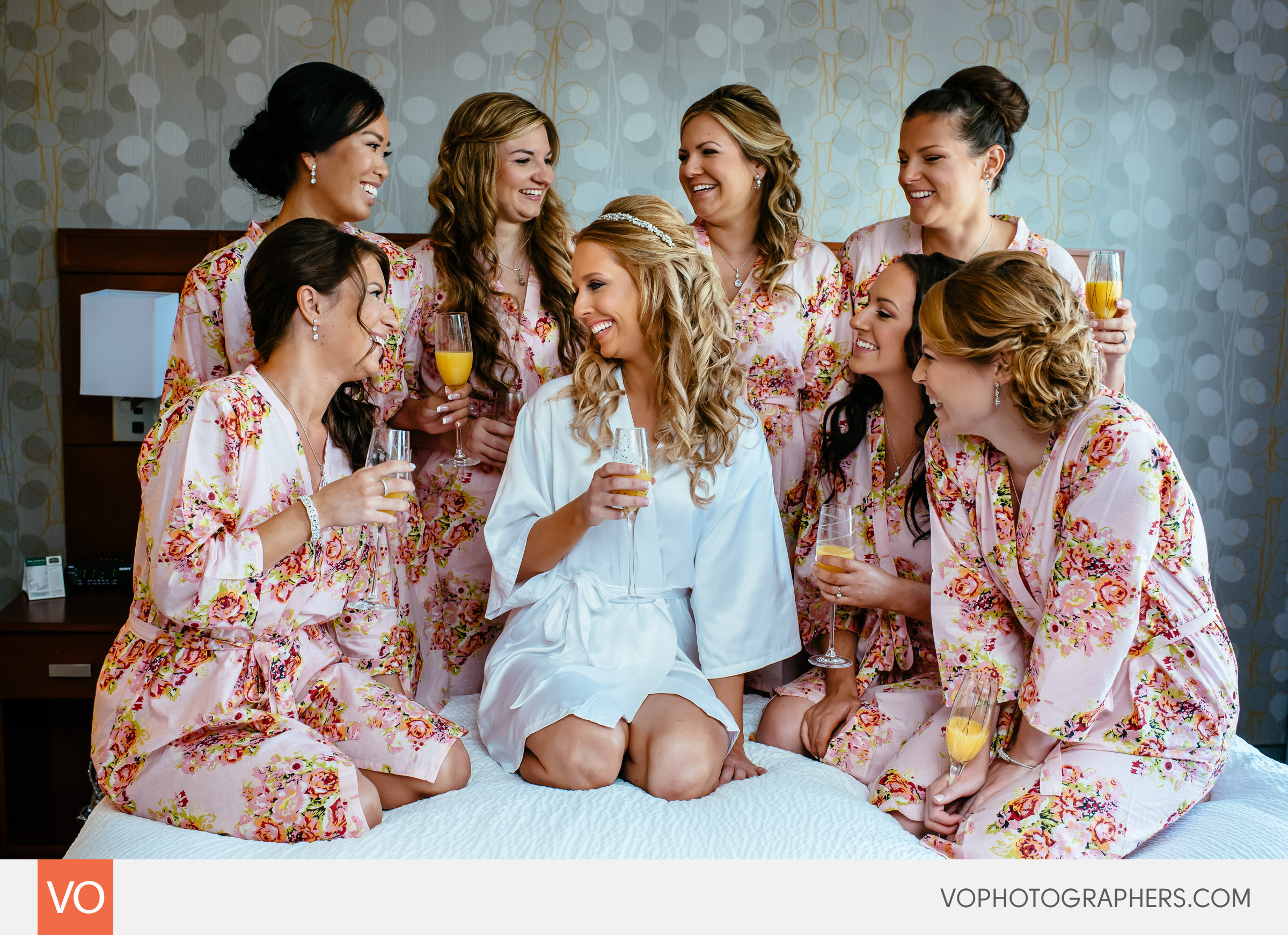 Bridesmaids on a bed
